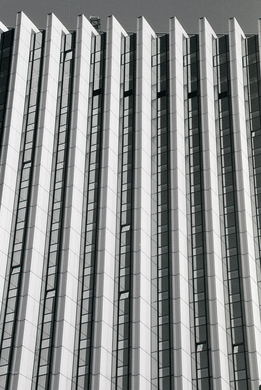 detailed view in black and white of the congress hotel facade in chemnitz, an example of the so-called ‚ddr-modern' architecture.
